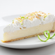 Slice of key lime pie on a plate